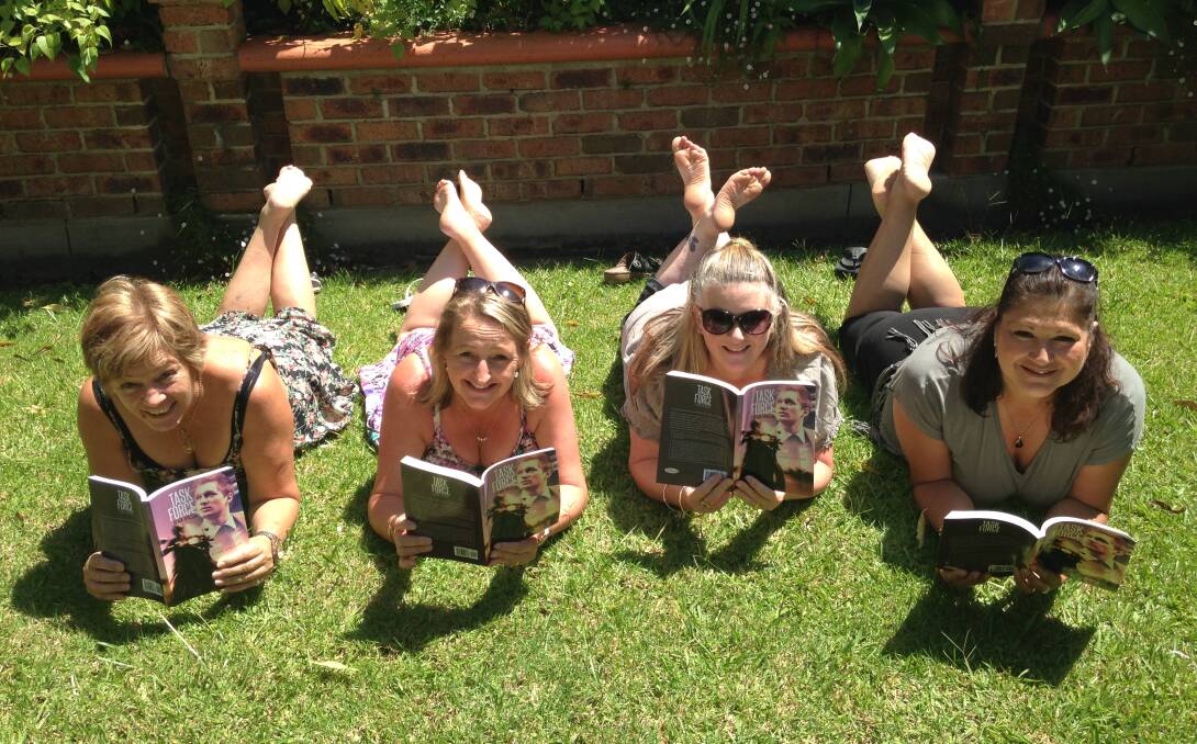Fashionista: Canberra ladies Deb Dickson, Janelle Chapman, Sasha Pighin, and Athina Whild were caught relaxing in the Bay with a good book. 