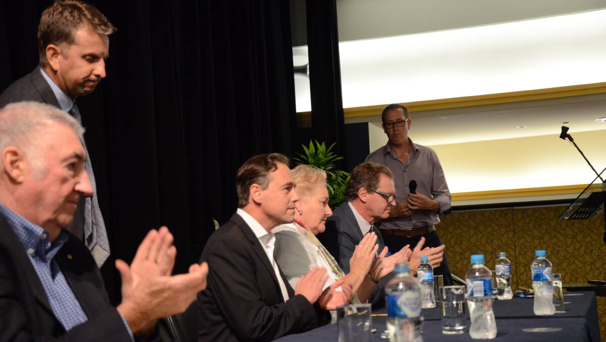 BAT CRACKS: The united front of three tiers of government on Batemans Bay's flying fox issue has cracked, just 24 hours after Bega MP Andrew Constance (standing) sat on a panel with Eurobodalla mayor Lindsay Brown (right, seated) and declared unity. PICTURE: Emily Barton.