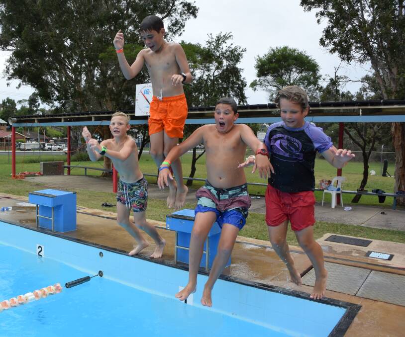 COOL KIDS: Jerome and Eli Chatfield, Kobi Briggs and Jed Salmon beat the heat at Batemans Bay Swimming Centre.