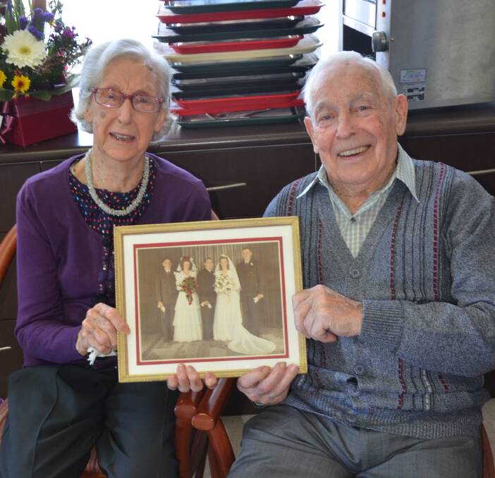LASTING LOVE: Joy and Norm Miles celebrate their 70th wedding anniversary at Maranatha Lodge on Wednesday with a photo of their wedding day in 1946.