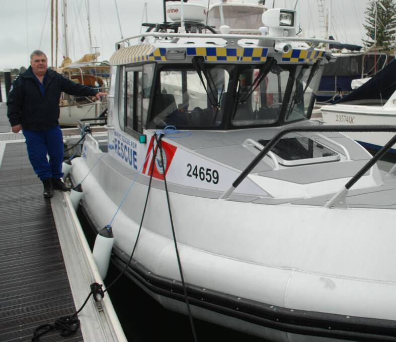 Batemans Bay Marine Rescue unit commander Michael Syrek with the new Ocean Cylinder vessel.