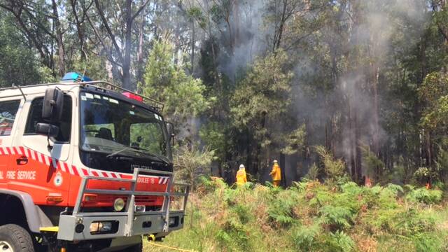 Broulee RFS fighting the fire. Picture: Stan Gorton.  