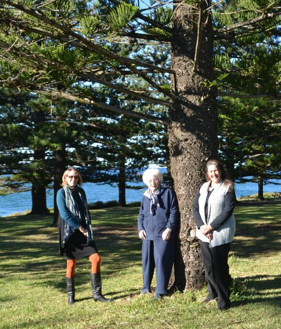 MOVING FORWARD: Eurobodalla Shire Councillors Liz Innes and Danielle Brice and Tuross resident Maureen Baker (centre) want the Norfolk Pine plantation in Tuross heritage listed. 