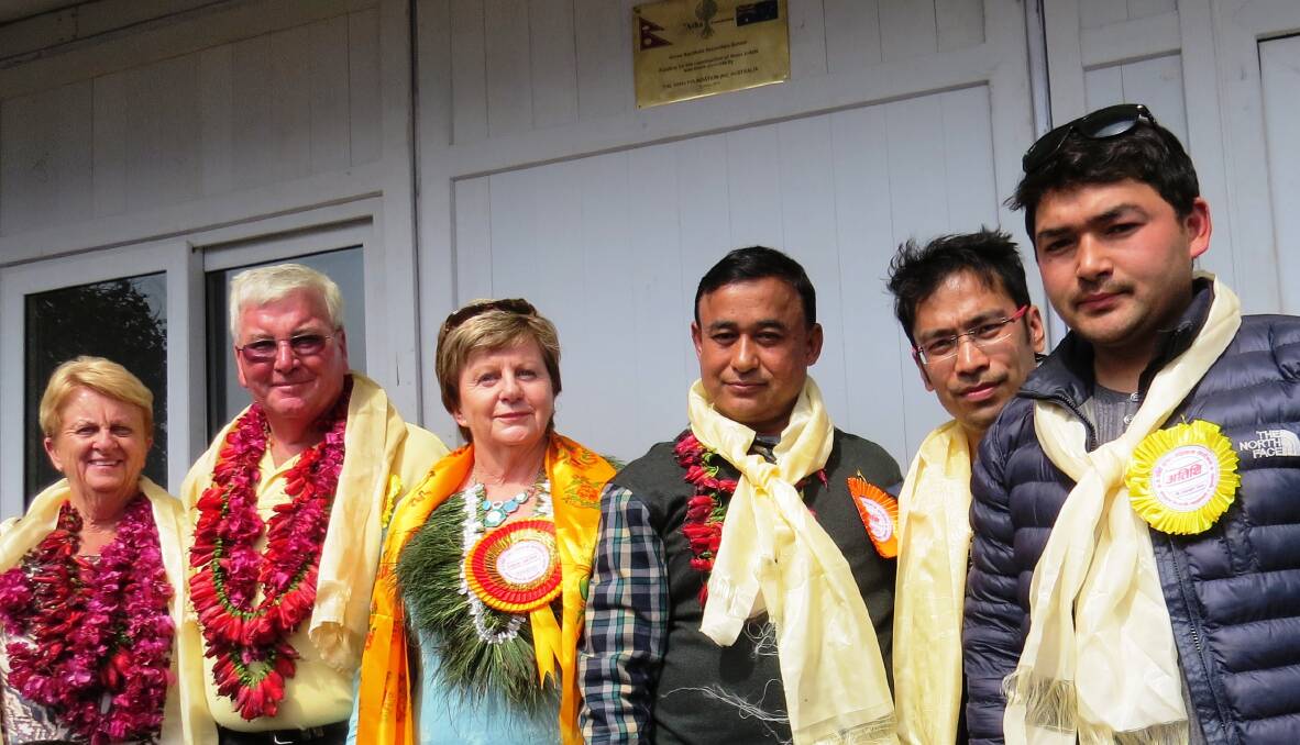 HELPING HAND: Asha Foundation members Pat Reid and Rohan and Pauline Gleeson officially open new classrooms at a school in Bhadratar with Nepali guests and an Asha staff member.