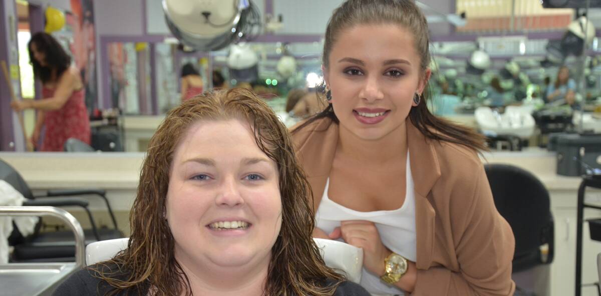 HAIR DO: Renee Wu from Tura Beach and Nicole Boneham from Tomakin finished the TAFE hairdressing course on Tuesday. 