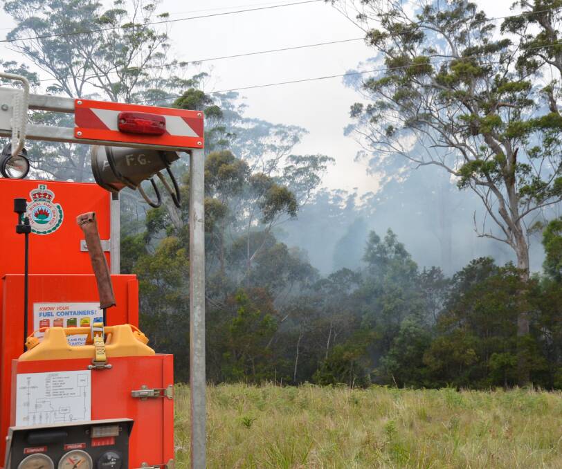 BUSH FIRE: Three Rural Fire Service crews took two hours to get a fire at East Lynne extinguished on Friday. Drug plants were found at the site. 