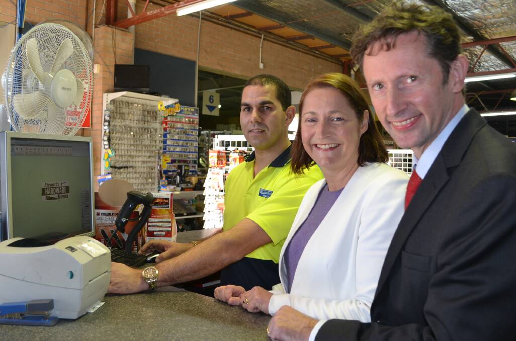 QUICKER: Stewart’s Hardware owner James Stewart shows the benefits of quicker broadband to Gilmore Labor candidate Fiona Phillips and Shadow Minister for Regional Communications Stephen Jones.