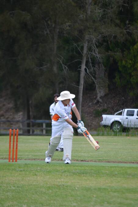Tom Purcell flicks the ball off his legs to the boundary. 