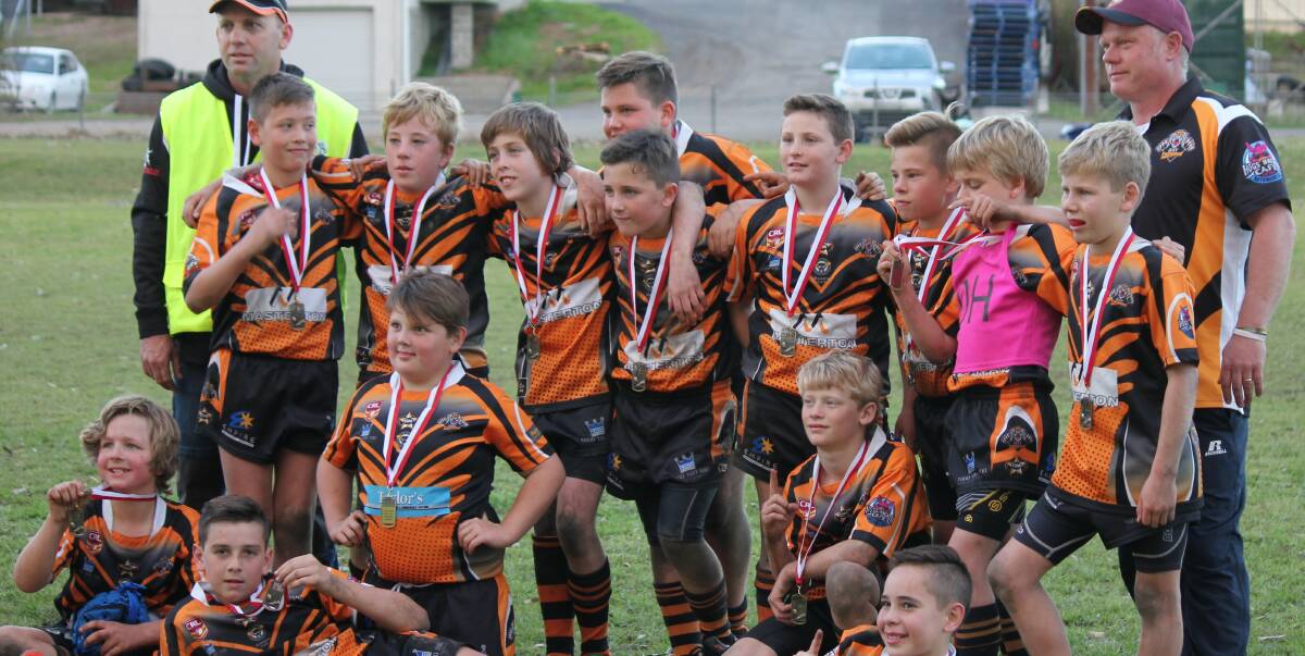 WINNERS: The U12 Batemans Bay Tigers side, which won the Bega Carnival rugby league competition.