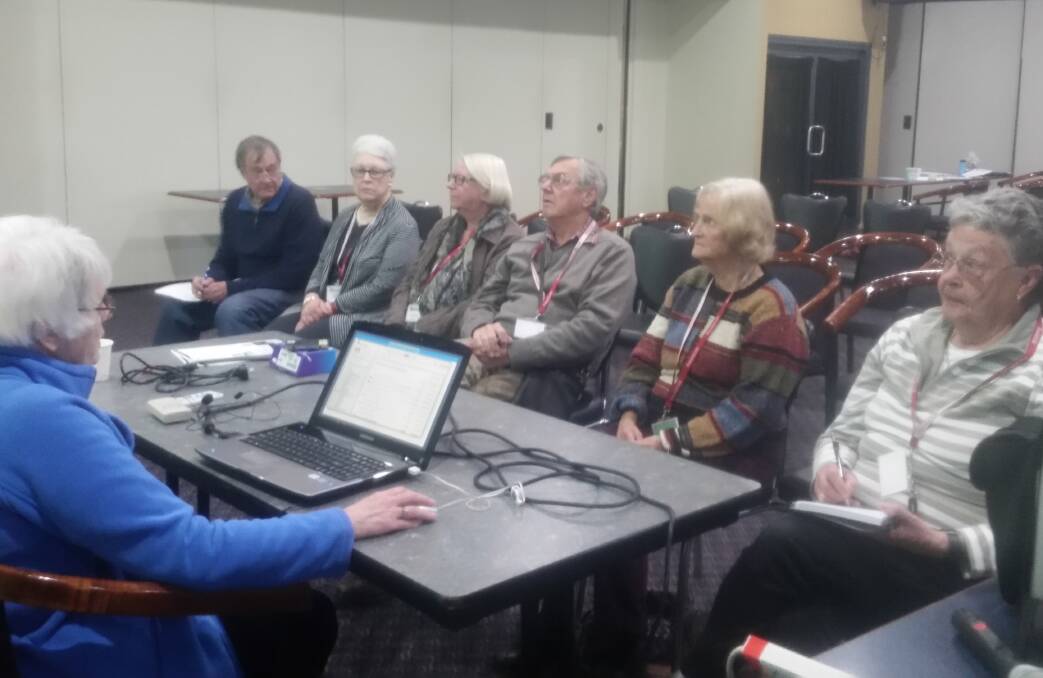  Using technology: Cora Num leads the genealogy group at the August meeting of EuroSCUG (Eurobodalla Seniors Computer Users Group).