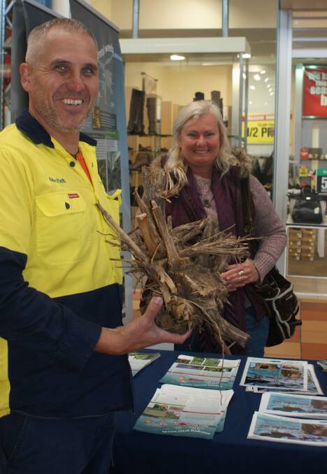 Weed watch: Council’s Environmental Project officer Mitchell Jarvis with one of the weeds bought into the Council Plant swap stall last World Environment Day.