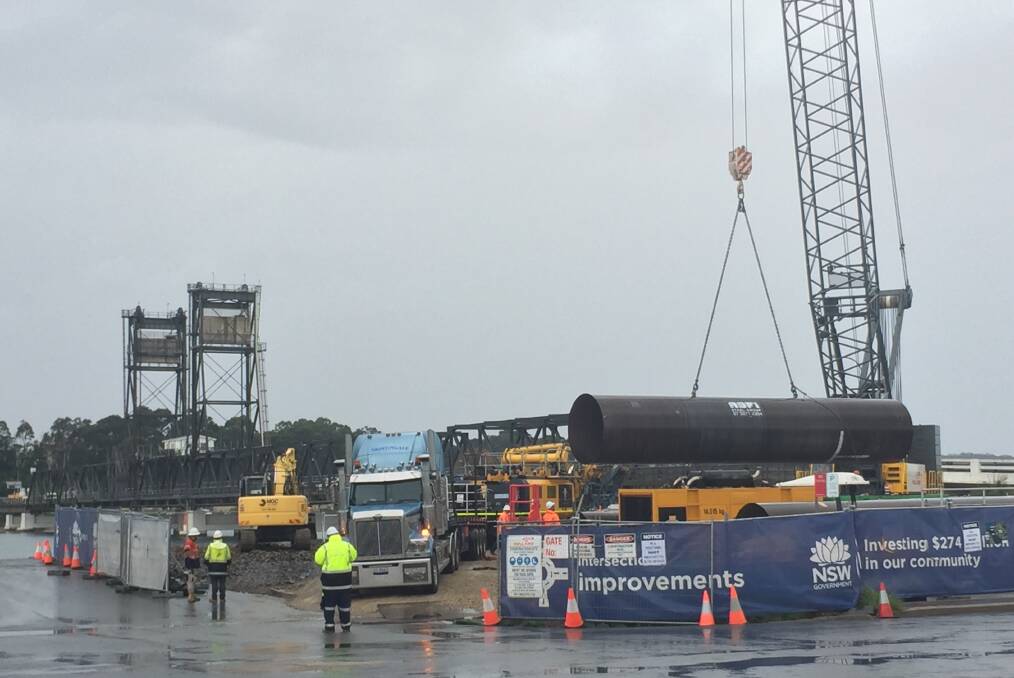 MAY 3: On a rainy Friday morning, the casings for the first pilings of the Batemans Bay Bridge replacement were delivered to the southern Clyde River foreshore.
