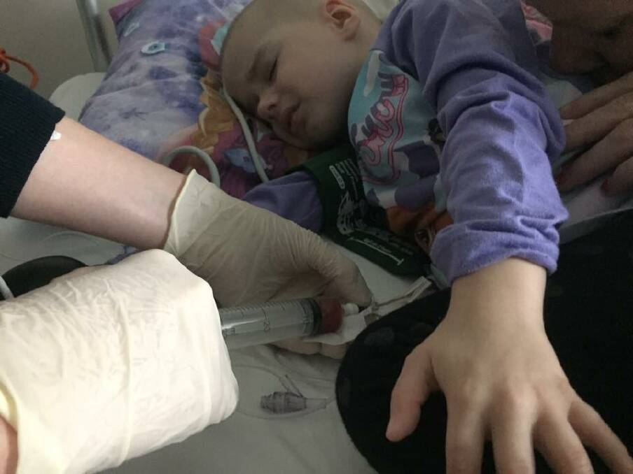 Addy during her bone marrow stem cell transfusion on Tuesday.