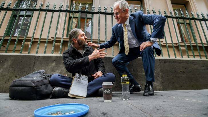 Prime Minister Malcolm Turnbull with homeless man Kent Kerswell Photo: Justin McManus