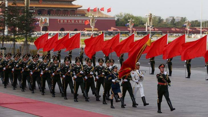 Soldiers parade at the Great Hall of the People in Beijing. Photo: Andrew Meares