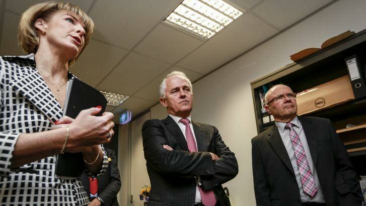 Prime Minister Malcolm Turnbull, Minister for Women Michaelia Cash and chairman of the Advisory Panel on Reducing Violence against Women and their Children Ken Lay. Photo: Eddie Jim