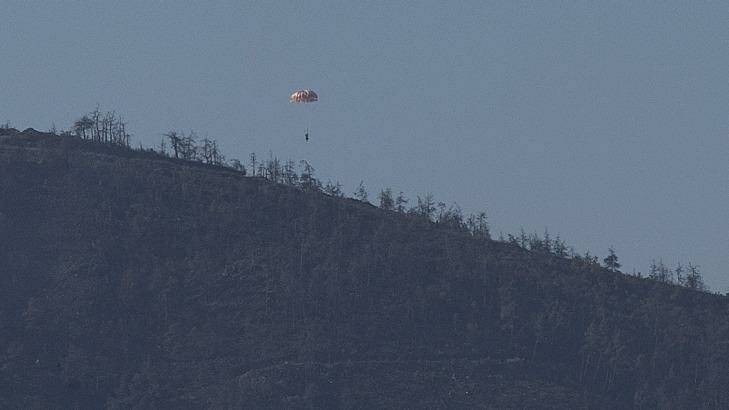 A pilot parachutes out of the warplane that went down in Syria. Photo: Anadolu Agency