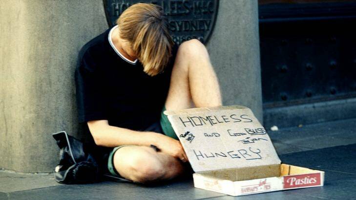 A homeless man appeals for help in Sydney.  Photo: Tanya Lake
