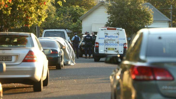 Police attend Mr Nguyen's home on Fitzroy Street in Campsie. Photo: Anthony Johnson