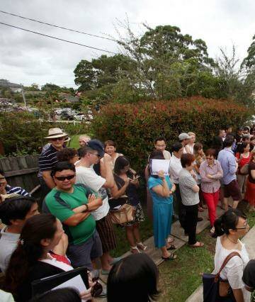 Bidders: Rapid population growth in Sydney is putting pressure on housing stock and property prices. Photo: Fiona Morris