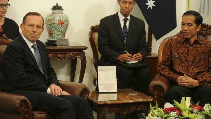 Tony Abbott and Joko Widodo meet after the new president's inauguration. Photo: Michael Bachelard