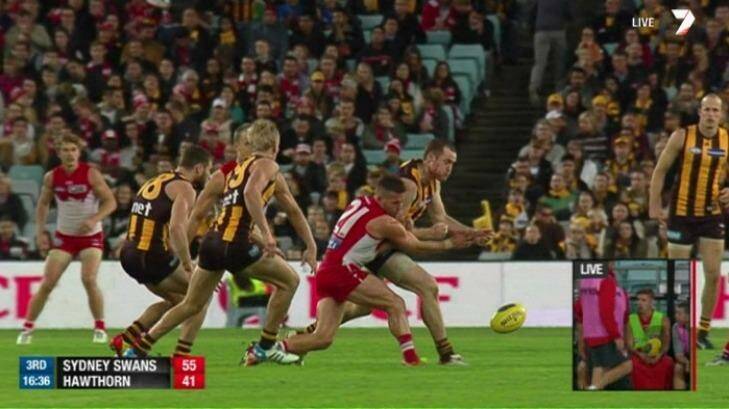 Hawthorn's Jarryd Roughead makes high contact to Sydney's Ben McGlynn. Photo: Channel Seven