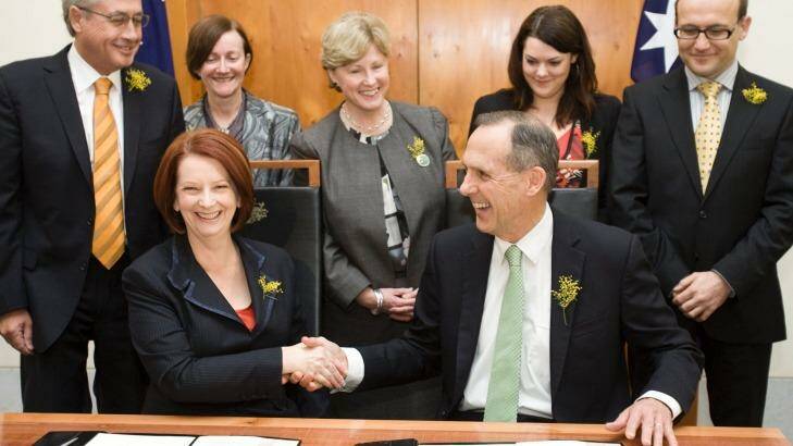 The Greens sign off on a deal in support of the Australian Labor Party in the Prime Minister's Office at Parliament House. Photo: Nicolas Walker.
