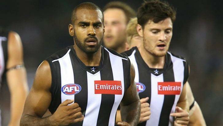 Heritier Lumumba (left) during a match against Fremantle earlier in the year. Photo: Pat Scala