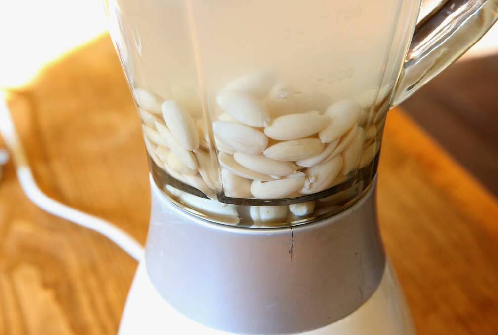 Step 3: Place almonds and two cups water and pinch of sea salt into a processor or blender. Photo: Scott Barbour