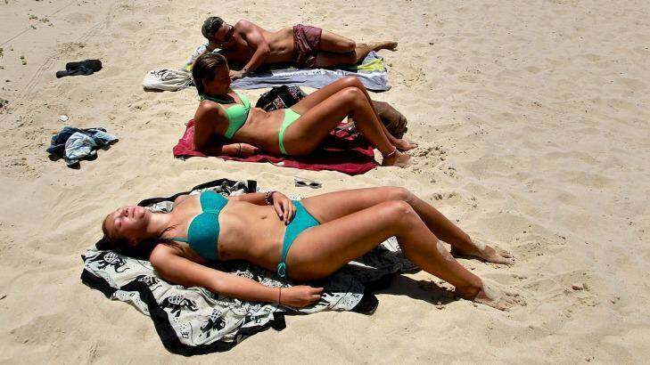 Sun bathers at North Cronulla beach. Photo: Ben Rushton