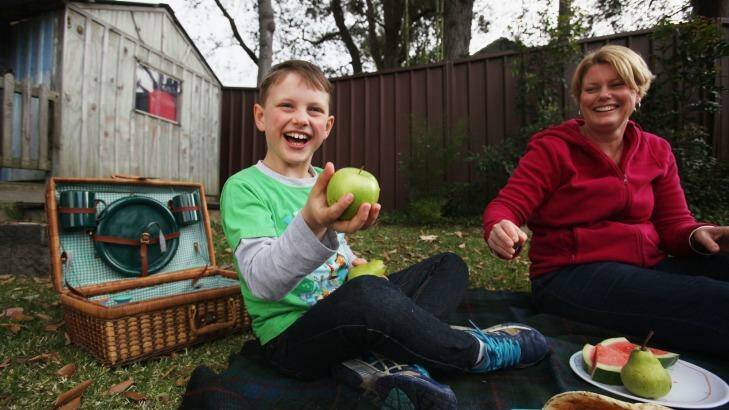 Fruit is just fine: Leonie Giddy and her son Bradford, 7 who is allergic to peanuts. Photo: Fiona Morris