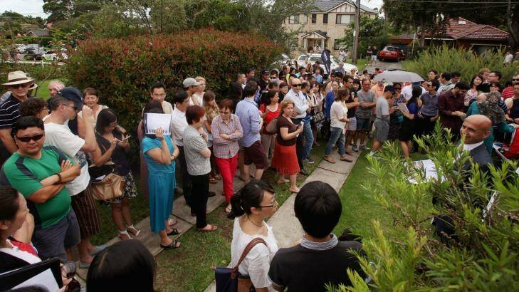 Bidders: Rapid population growth in Sydney is putting pressure on housing stock and property prices. Photo: Fiona Morris