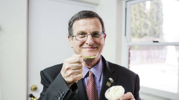 Shmuel Ben-Shmuel, Ambassador of Embassy of Israel, testing out the hummus flavoured icecream.  Photo: Jamila Toderas