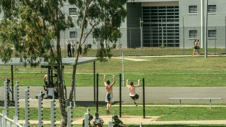 Prisoners exercise in  the yard at the Melbourne Remand Centre.  Photo: Justin McManus