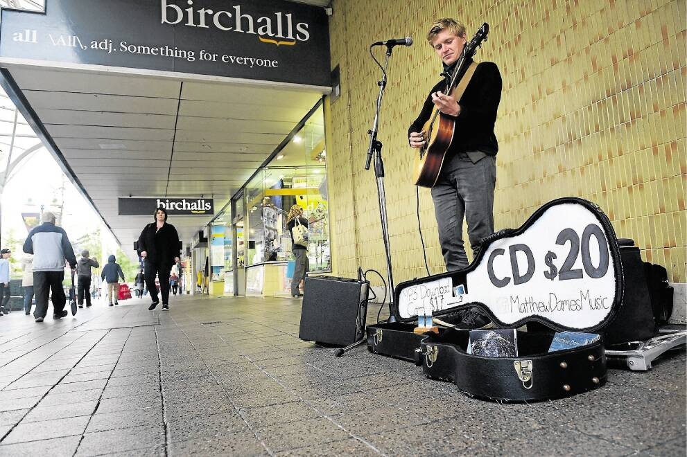 PIC: PAUL SCAMBLER and REPORT: Manika DADSON.BUSKER Matthew Dames 25yr of Launceston, busking in the Brisbane Street mall