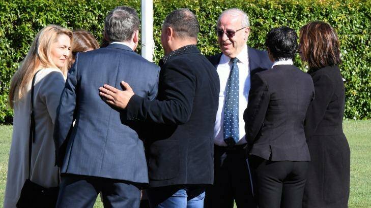 Eddie Obeid with members of his legal team and family outside the Darlinghurst Supreme Court on Monday.  Photo: Peter Rae