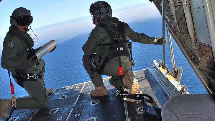 Searching the ocean: crew on the Hercules C-130J plane. Photo: Liam Ducey