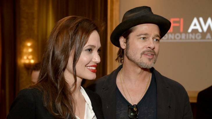 BEVERLY HILLS, CA - JANUARY 09:  Director/actress Angelina Jolie (L) and actor/producer Brad Pitt attends the 15th Annual AFI Awards Luncheon at Four Seasons Hotel Los Angeles at Beverly Hills on January 9, 2015 in Beverly Hills, California.  (Photo by Michael Kovac/Getty Images for AFI) Photo: Michael Kovac