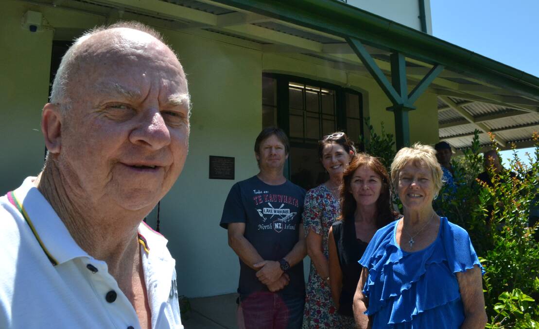 TEAM NEV: Neville Crowe, left, has learnt to read at the age of 65, with the support of an Anglicare team, including Steve Dean, Roz Hunter, Catherine McGrath and Dot Budworth. His literacy tutor David McDougall is not pictured.