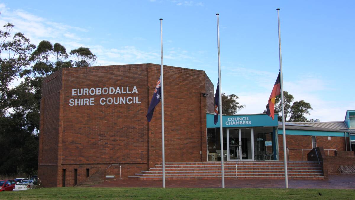 Flags flying at half-mast for the late Fergus Thomson, OAM, on Friday, July 24, 2015. The first popularly elected mayor of Eurobodalla Shire Council died of brain cancer that morning.