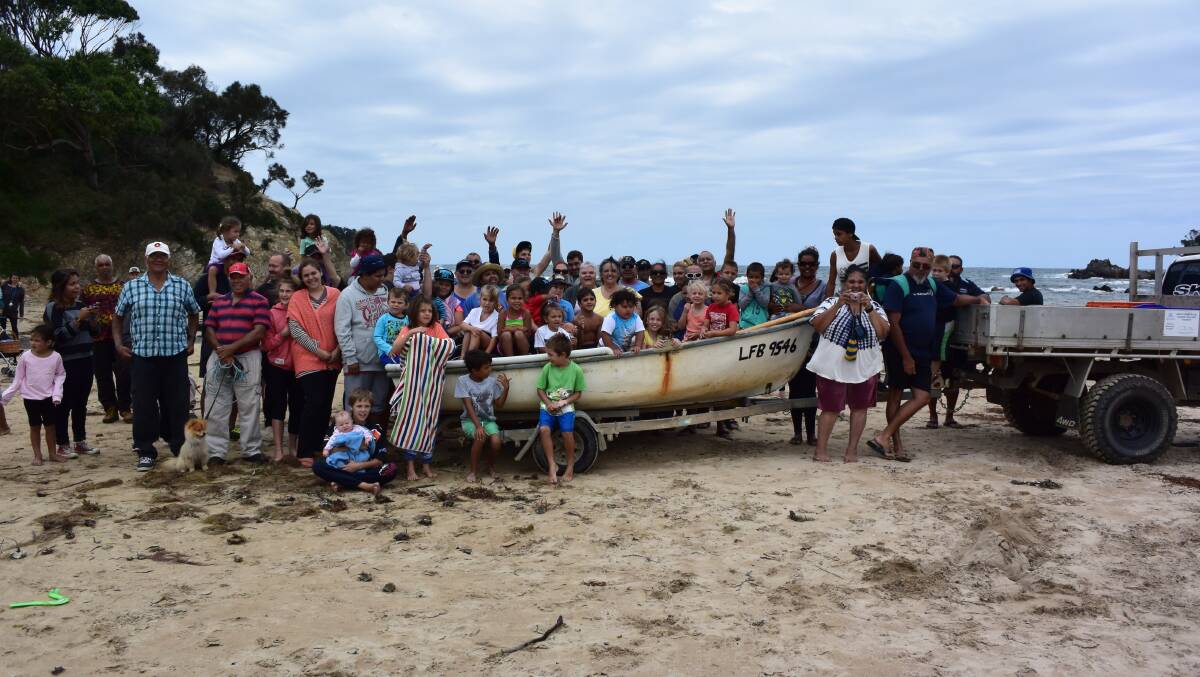 STANDING UP: Members of the South Coast indigenous community gather at Barlings Beach at Tomakin to protest against lack of recognition of indigenous fishing rights. 