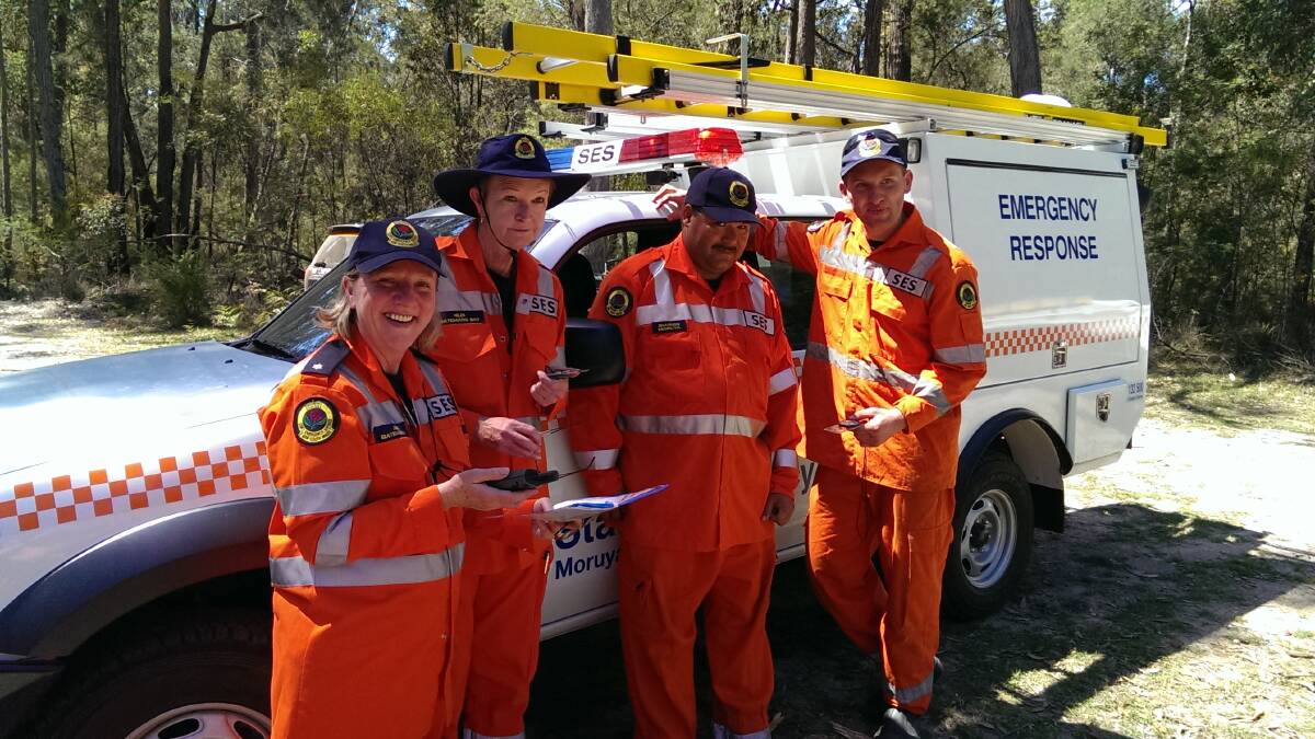 ORANGE DAWN: Janine Rogers and Helen Clifton of Batemans Bay SES and Shannon Greene and Caden Threlfall of Moruya SES at a recent map reading exercise.