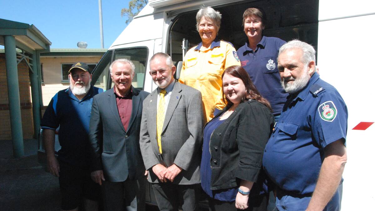 GREAT TRIBUTE: Bob McKinnon (Sutherland Shire mason) Allan Brown (Coeur de Lion Narooma Masonic Lodge secretary), David Herring (mason and father of the late Marc Herring) Barb Smith and Jen Pearson (Eurobodalla RFS Catering), Alison Herring (Marc’s widow) and Bruce Charles (Eurobodalla RFS Catering) with the Eurobodalla RFS catering van which will be fitted out thanks to the $5000 donation from Masonic Lodge Secretary’s Association and the Sutherland Shire and Bankstown Freemasons’ charity groups.
