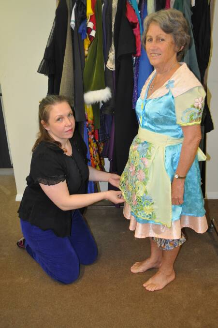 COSTUME CREATOR: Bay Theatre Players’ Sam Lloyd fits out a costume for Marilyn Edwards.