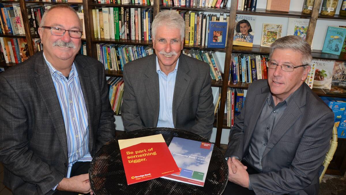 TAKING IT TO THE BANK: Bendigo Bank regional
manager Jim Crawford, Moruya businessman Chris Gandy and Bendigo Bank state community strengthening manager Chris Pursehouse are gauging whether there is enough interest in the shire to establish a community bank in Moruya.
