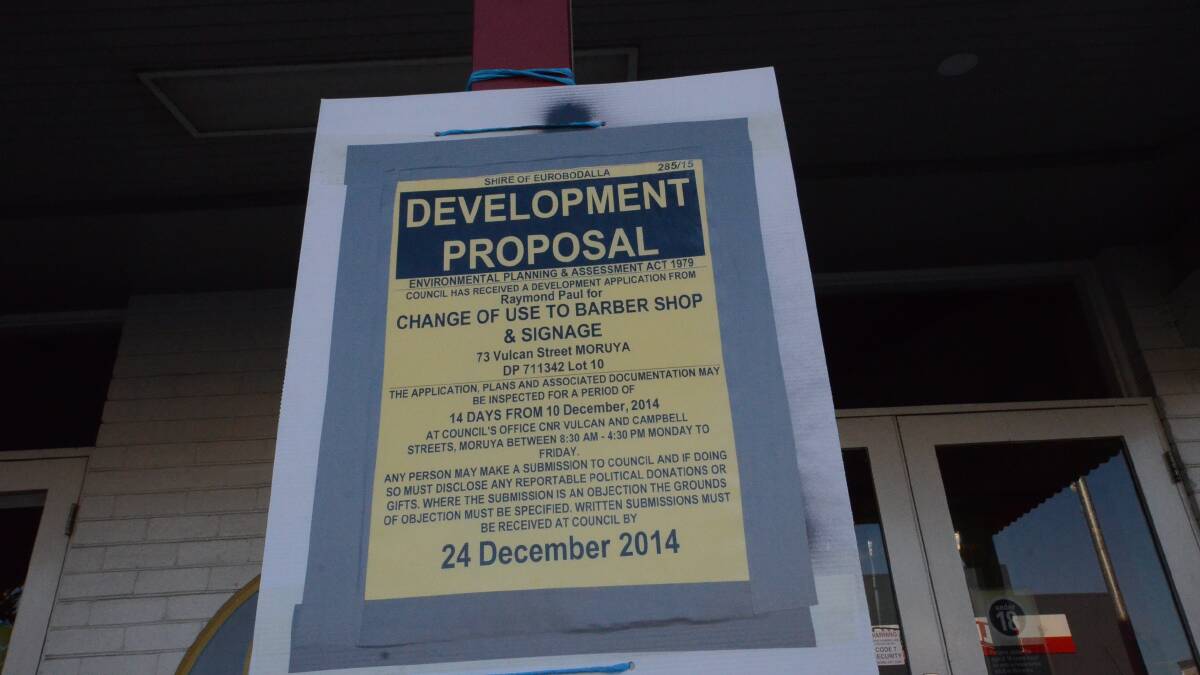 COMING CUTS: The development application notice outside the site of the Air Raid Tavern in Vulcan Street Moruya.