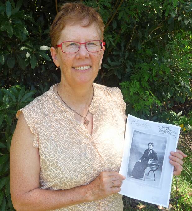 n Life Writing course tutor, Gretta Beveridge, with a photograph of her great-grandmother who was murdered in the early 1900s. 
