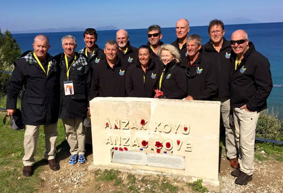 MEMORIAL: The team at Anzac Cove on the eve of the Anzac Centenary.