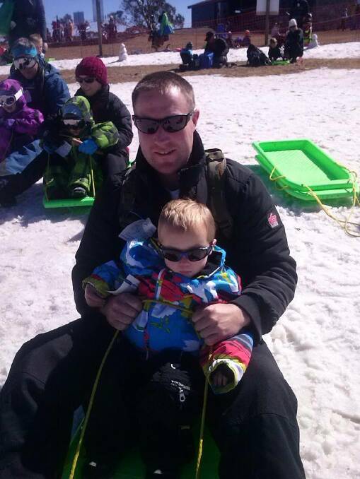 Daniel Bailey of Narooma with Cruz Bailey. Cruz turned 2 on Saturday and dad took the kids to Mt Selwyn Snowfields.