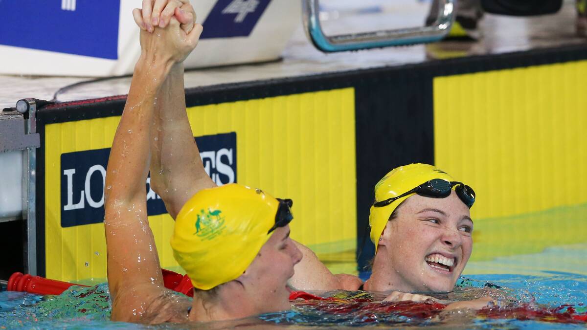Cate Campbell (R) of Australia celebrates winning the gold medal with silver medallist Bronte Campbell of Australia after the Women's 100m Freestyle Final. PICTURE: GETTY